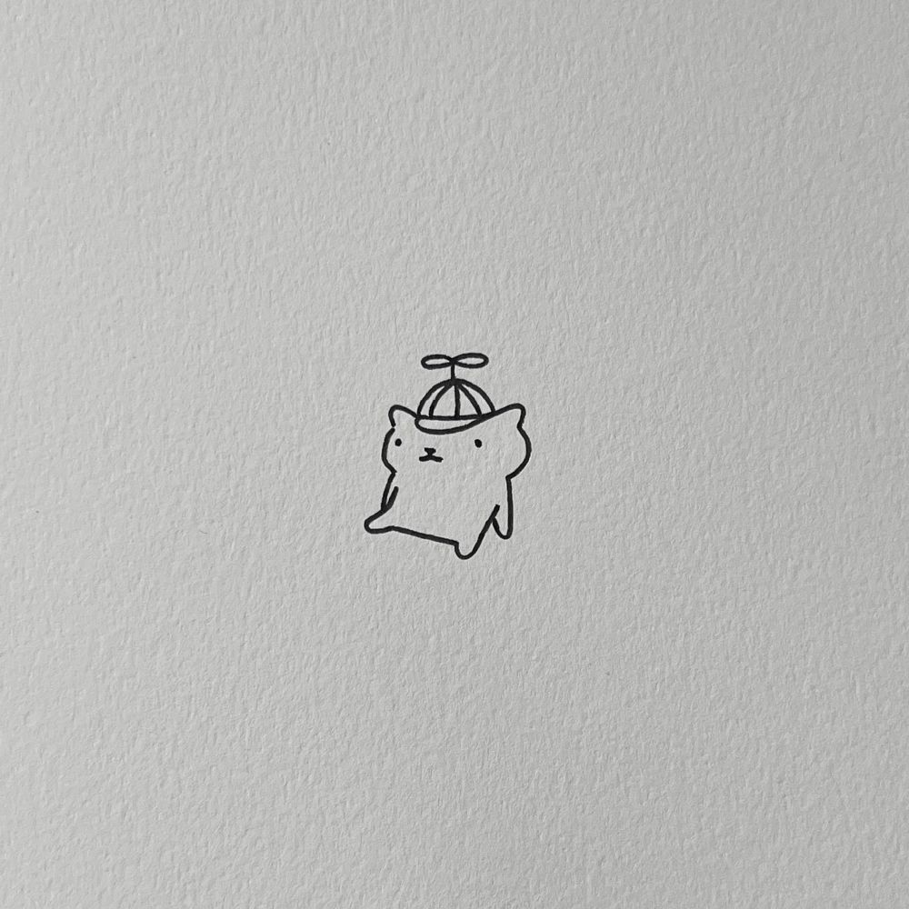 a poorly drawn cat wearing a silly hat