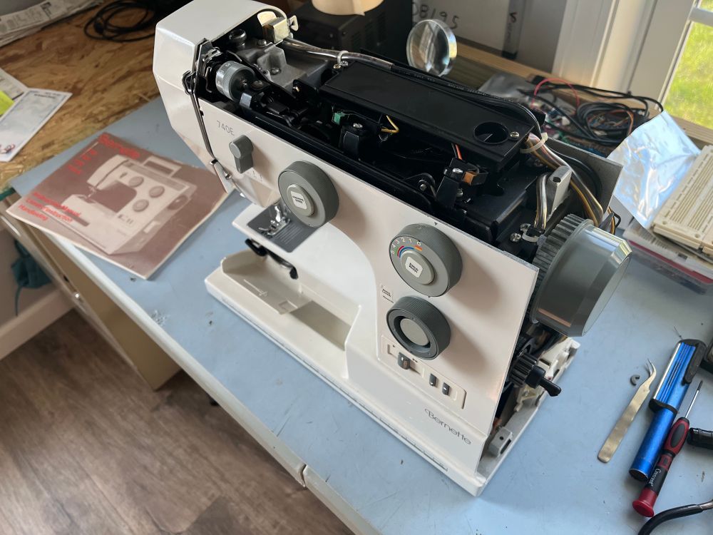 Sewing machine with top and side cover removed 