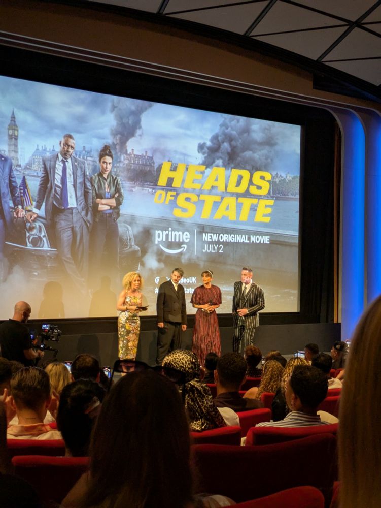Ilya Naishuller, Priyanka Chopra Jonas and John Cena introducing Heads of State