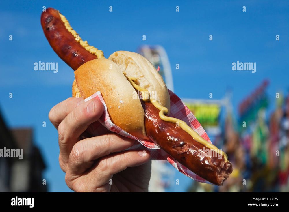 German Semmel Wurst, which is a tiny roll and a super long sausage. There is sometimes sauerkraut in the roll. But the important part is the proportions, 80% wurst, 20% semmel. 