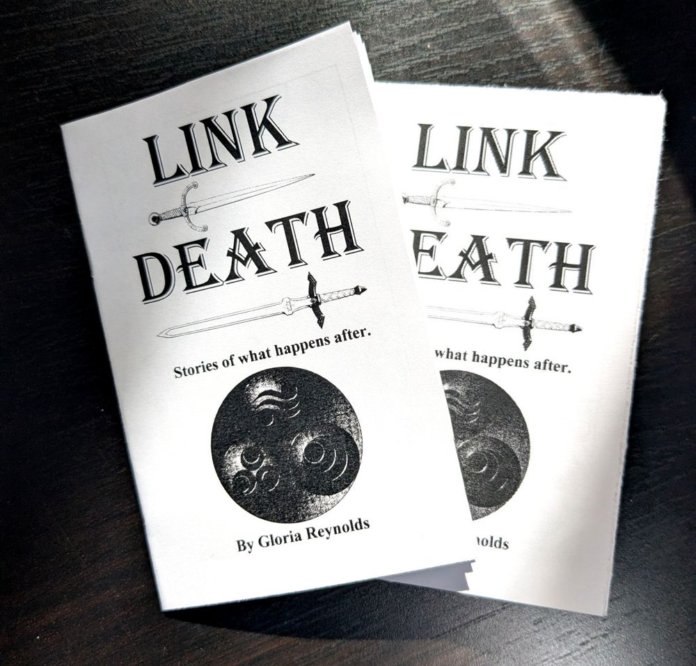 Printouts of a zine called "Link Death"
