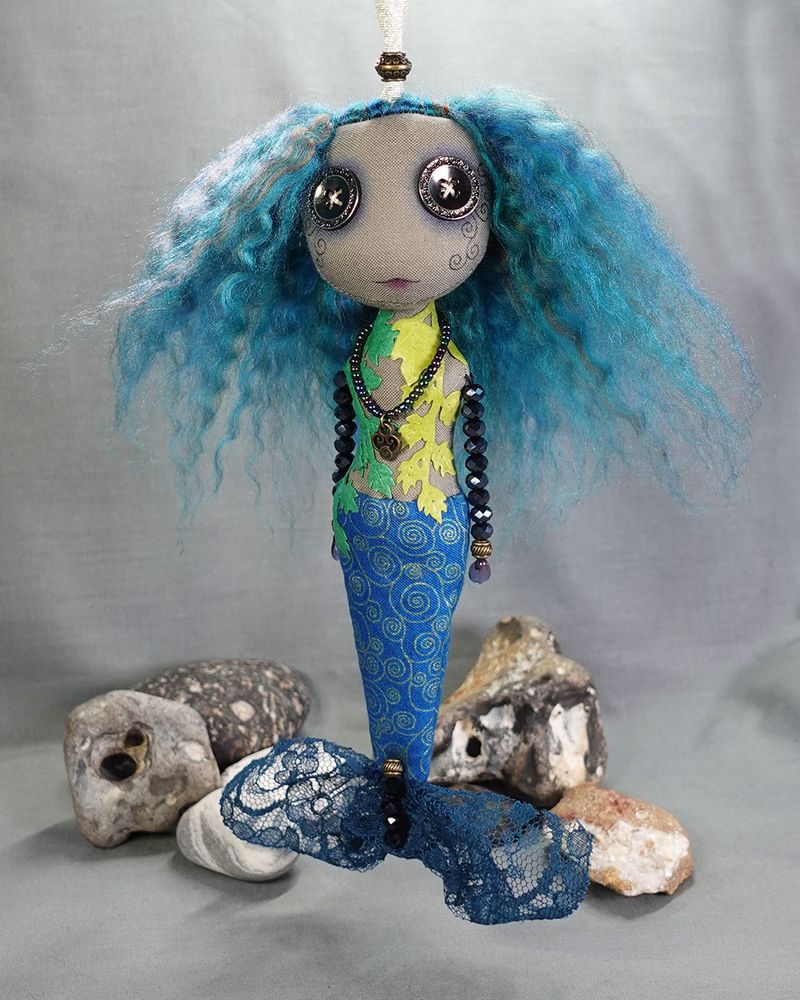water elemental undine doll with blue hair and mermaid tail