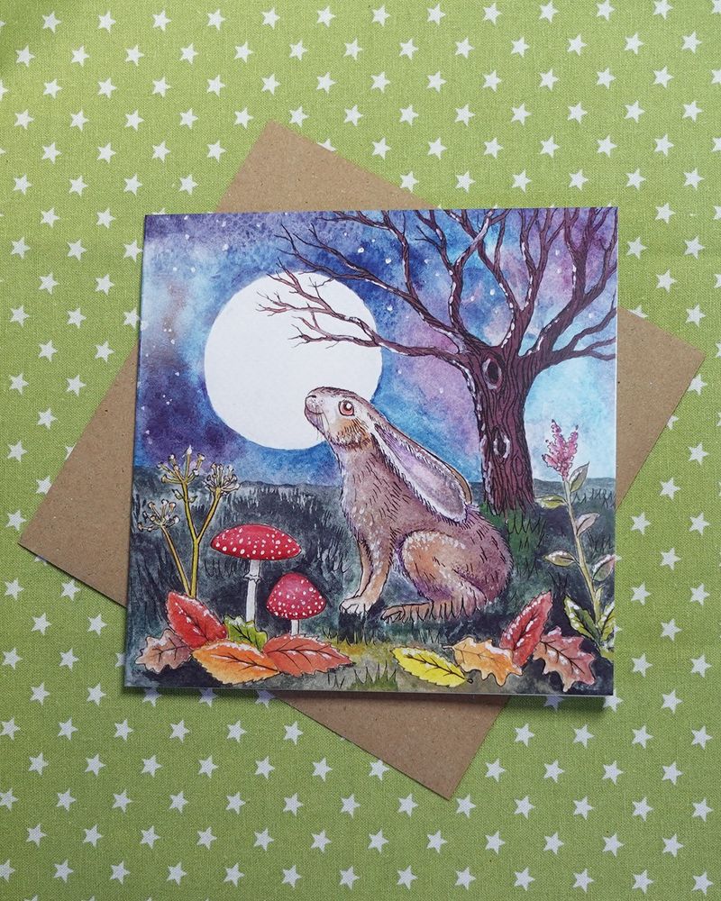 greeting card featuring a moon gazing hare in autumn