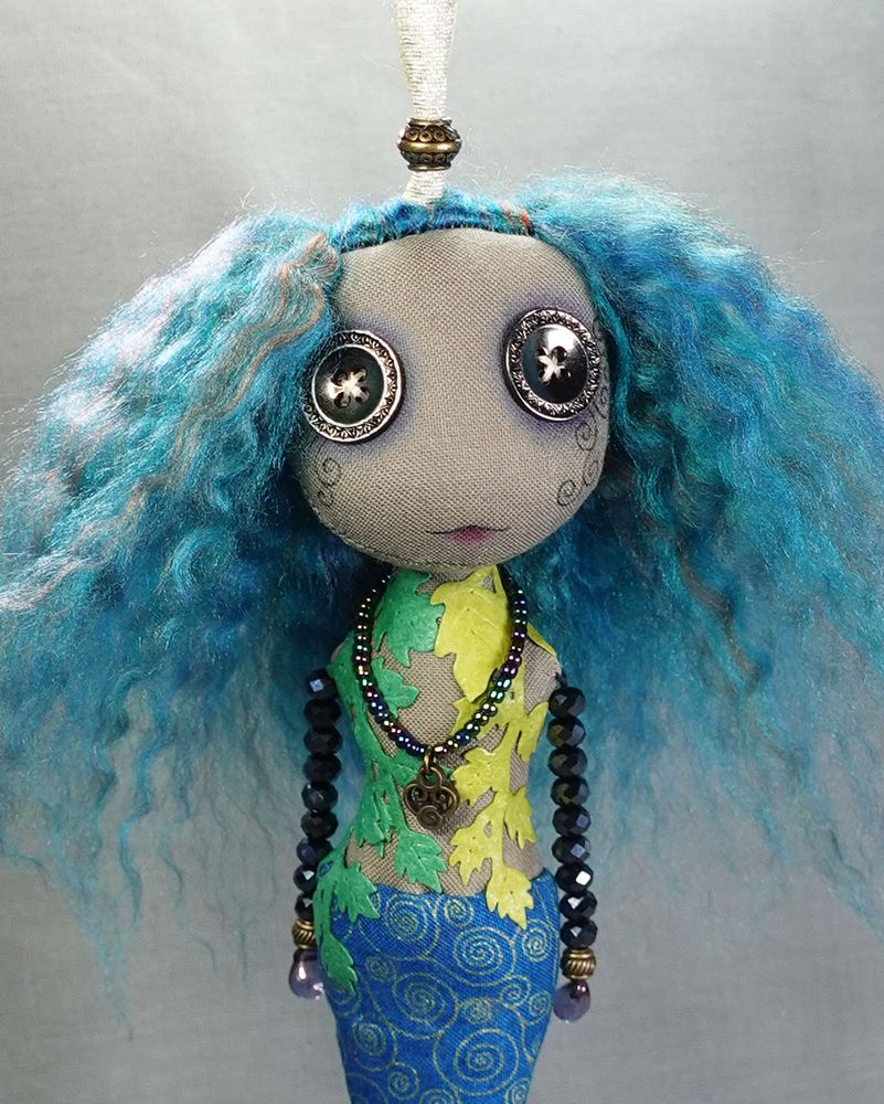 water elemental undine doll with blue hair and mermaid tail