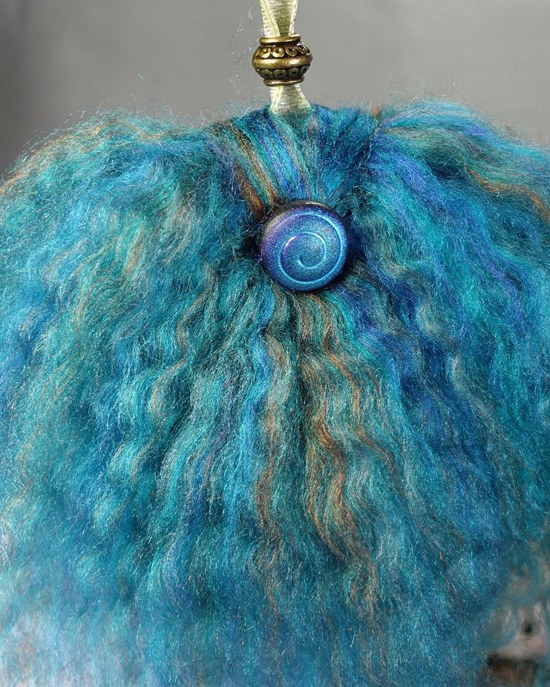 blue doll hair with glass shell bead
