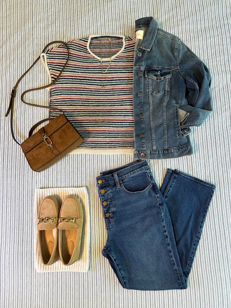 Flat lay of the Everyday Attitude Tee with J Crew Stovepipe jeans, H&M faux suede crossbody bag, and faux suede loafers