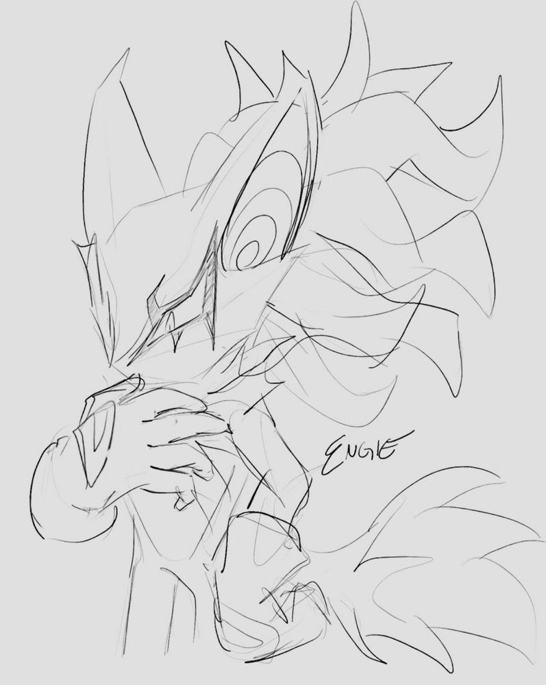 infinite with a hand on his hip and the other under his chin like he's thinking hard