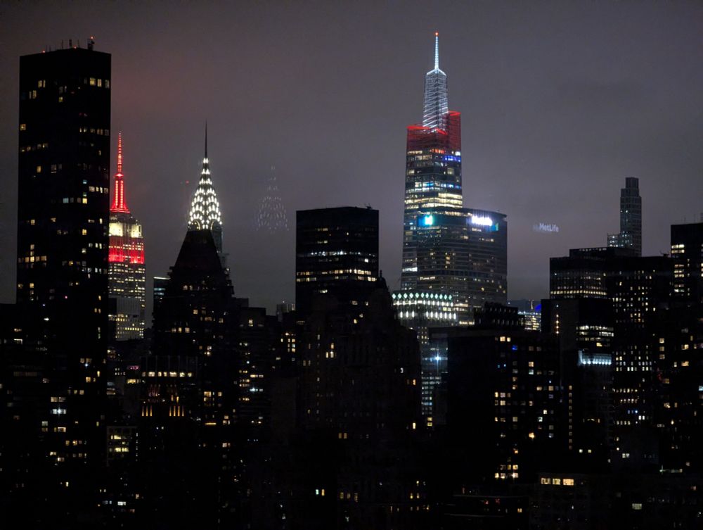 Empire and Vanderbilt buildings in red (and white) lights 