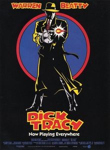 A black poster with a man in a trench coat and fedora, poster says: "Warren Beaty is Dick Tracy...now playing everywhere"