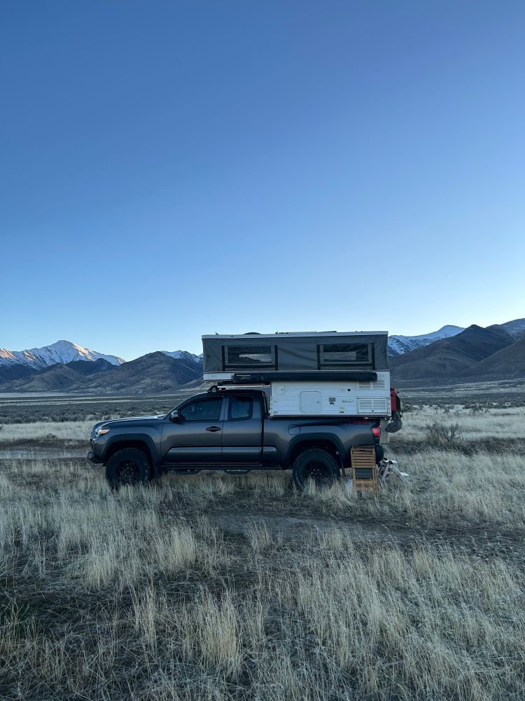 Toyota Tacoma pickup with All Terrain  Bobcat pop-up camper in the northern Nevada sagebrush 