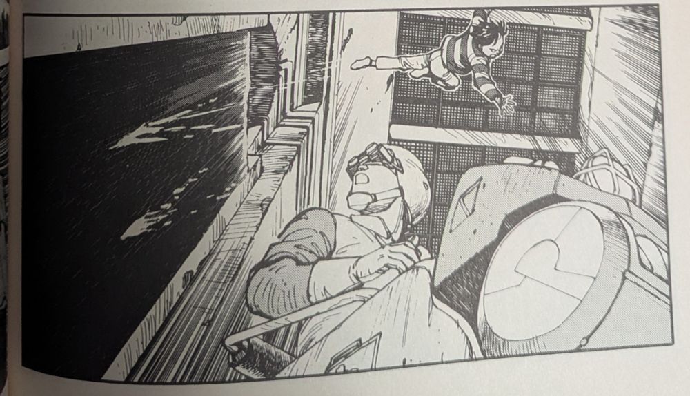 A panel from "AKIRA." Kaneda jumps backwards, after sliding down a sewer wall, over a security guard.