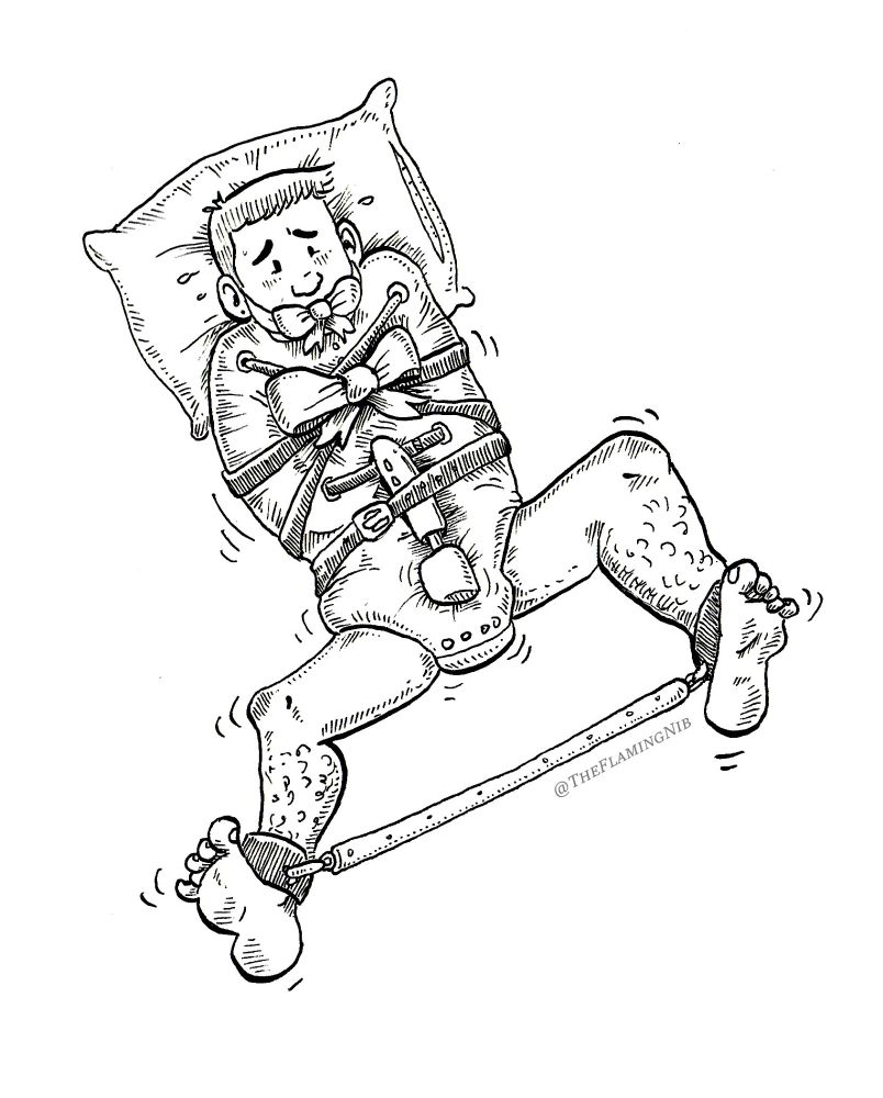 A boy restrained in a straitjacket with a giant bow, trembling from a spreader bar and hitachi wand on his padded crotch.