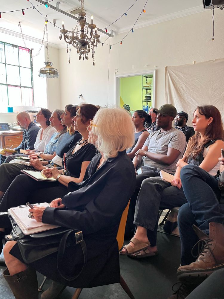 Side shot of the audience. 