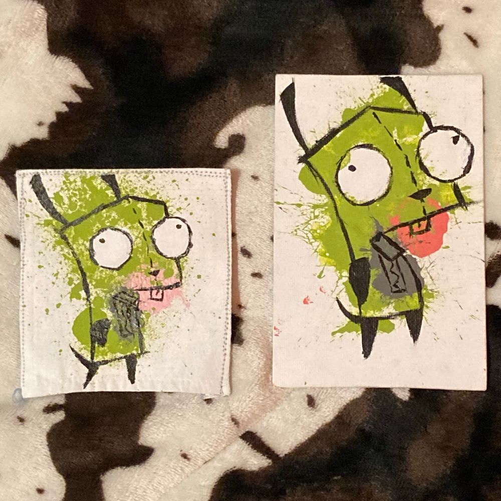 Gir from Invader Zim depicted on a pice of fabric. An art canvas is also along side it with the same image.