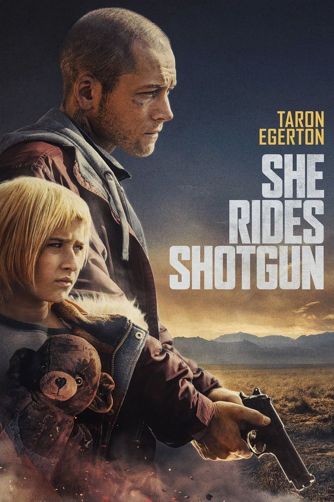 A girl is holding a teddy, a man next to her holding a gun. Behind them is open land and a dark sky next to the movie title, She rides shotgun