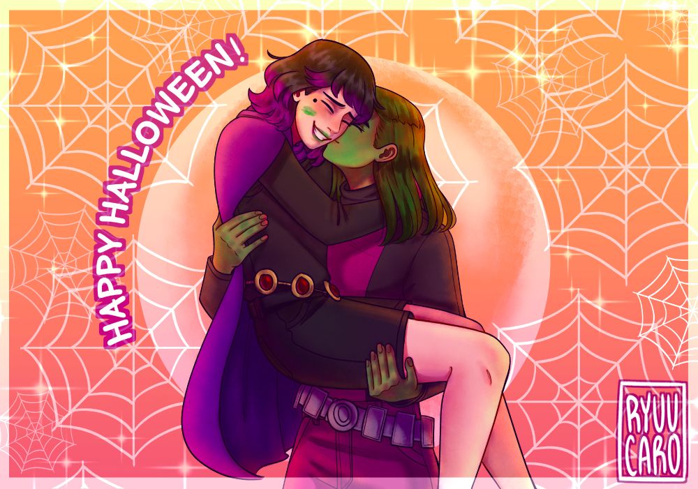 Akarsha stands dressed up as Beast Boy from teen titans and carrying Noelle in her arms. She is kissing her on the cheek and Noelle has green kiss marks on her other cheek and mouth. Noelle herself is dressed up as Raven from teen titans and smiling. 