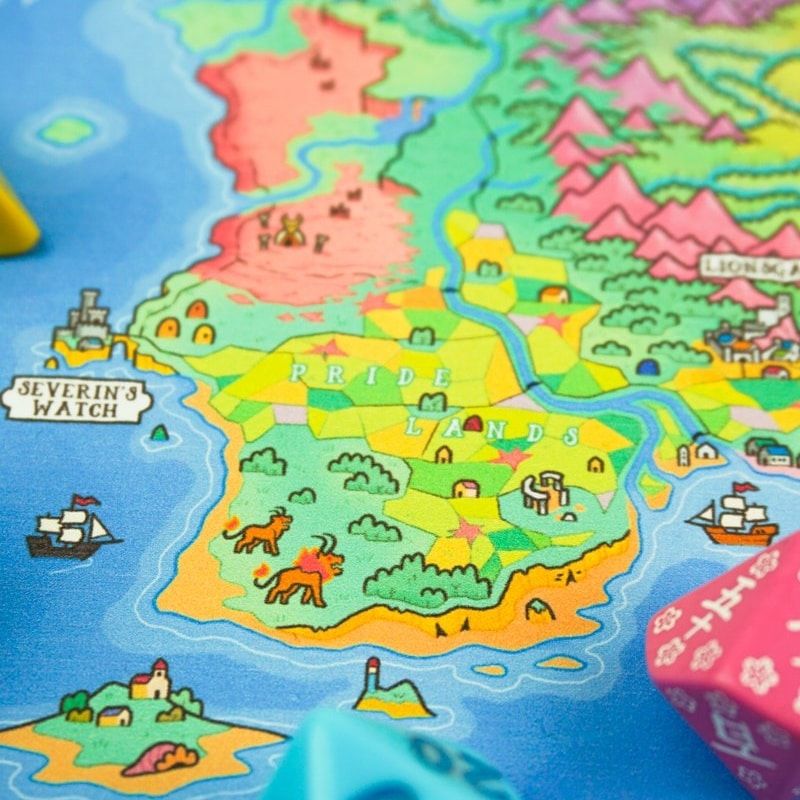 A photograph of a colourful map showing a region called the pridelands, with lots of farmland at display