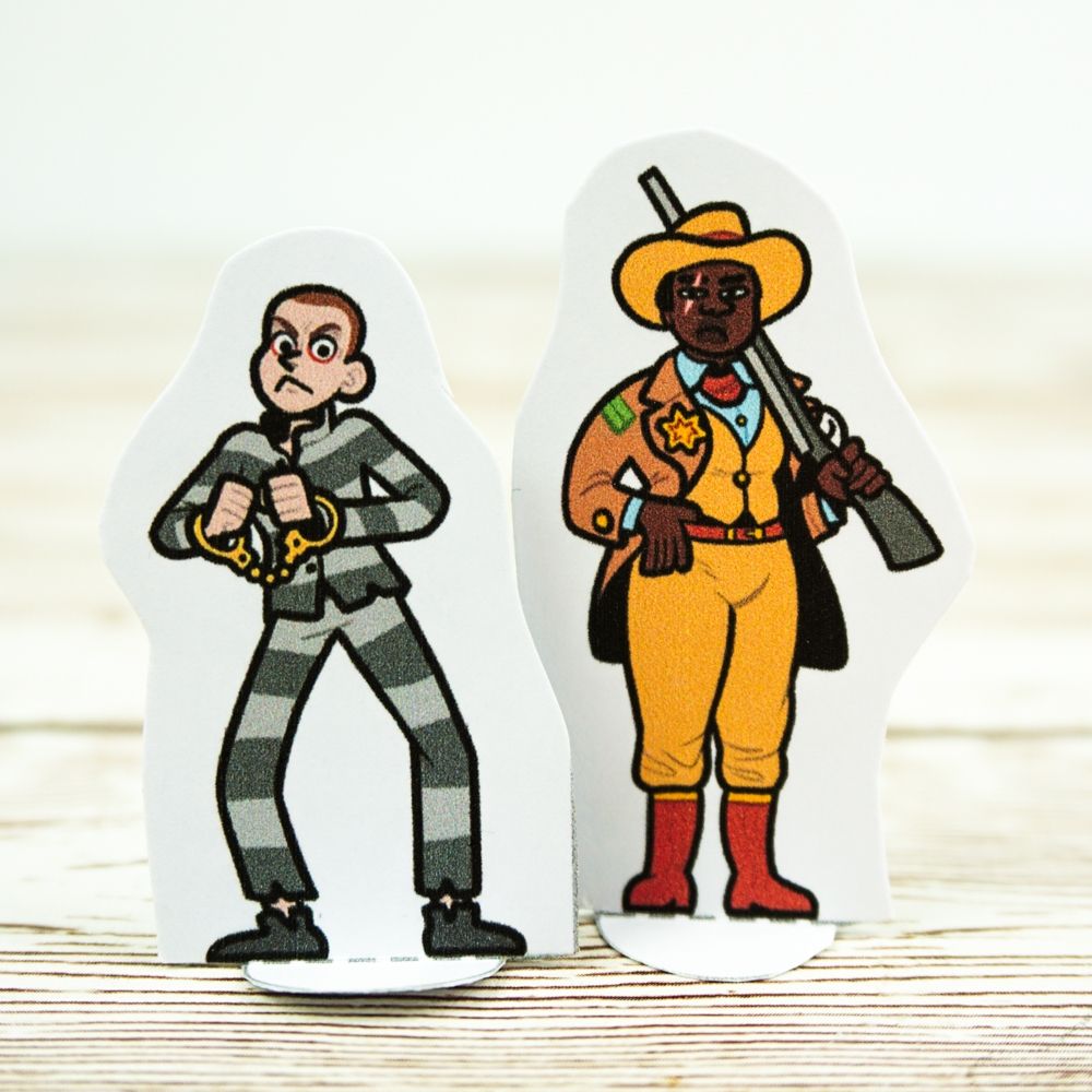 A photo of two paper minis: "Honest" Harry Prickle the prisoner and Sheriff Drumroll, a black woman in a yellow suit.