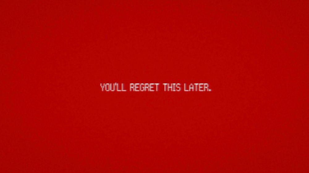 red background reading “you’ll regret this later.”
