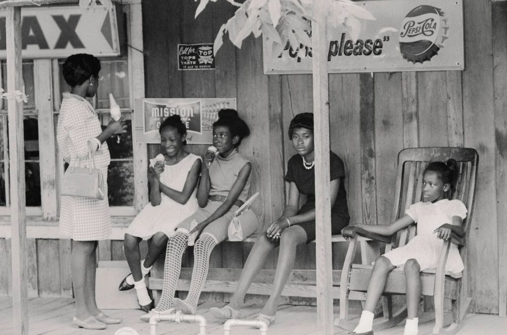 Black and white photograph. “Black-owned Grocery Store, Sunday, Mileston, Mississippi, 1968.” Photograph by Doris A. Derby.