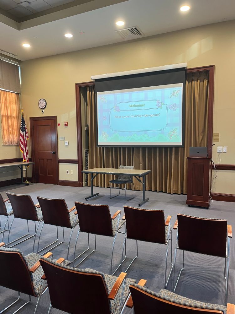 PowerPoint with chairs in front 