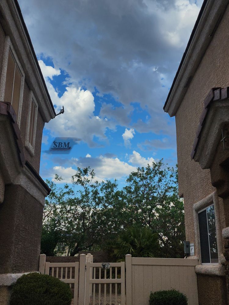 Light and airy cumulus clouds over a light blue sky