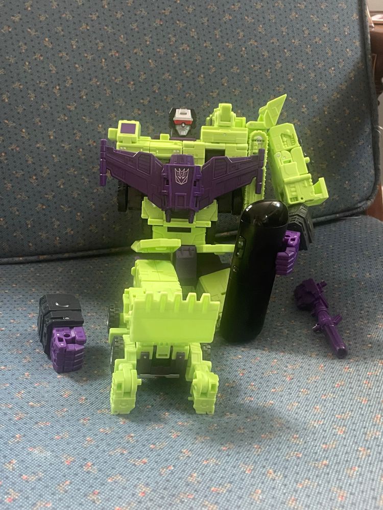 Transformers studio series 86 Devastator incomplete holding a remote toyphotography
