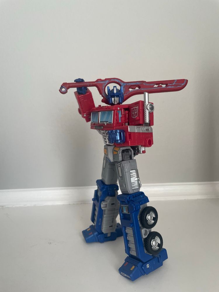 Optimus prime holding the Monado 