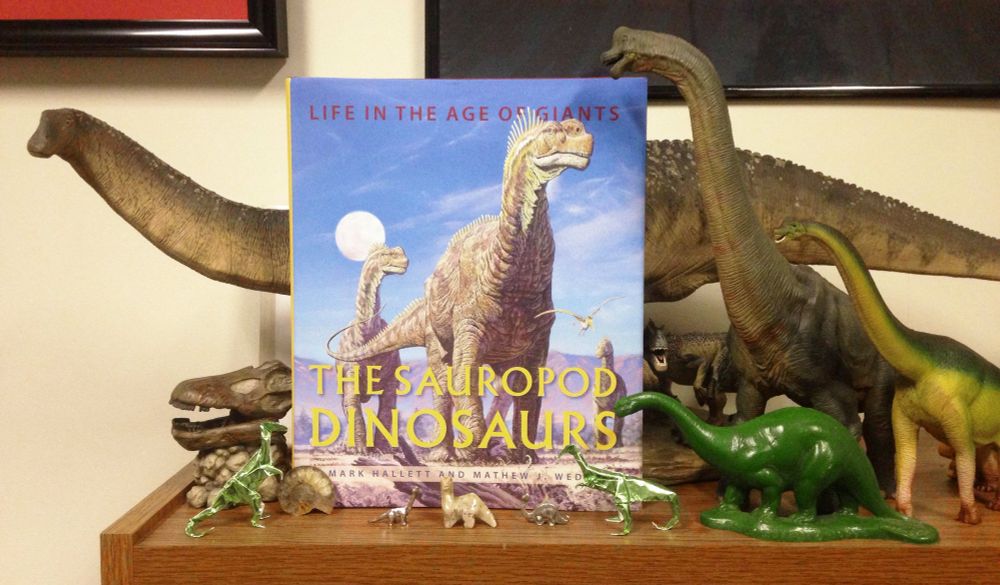 Hallett and Wedel's book with sauropod models and ornaments. 