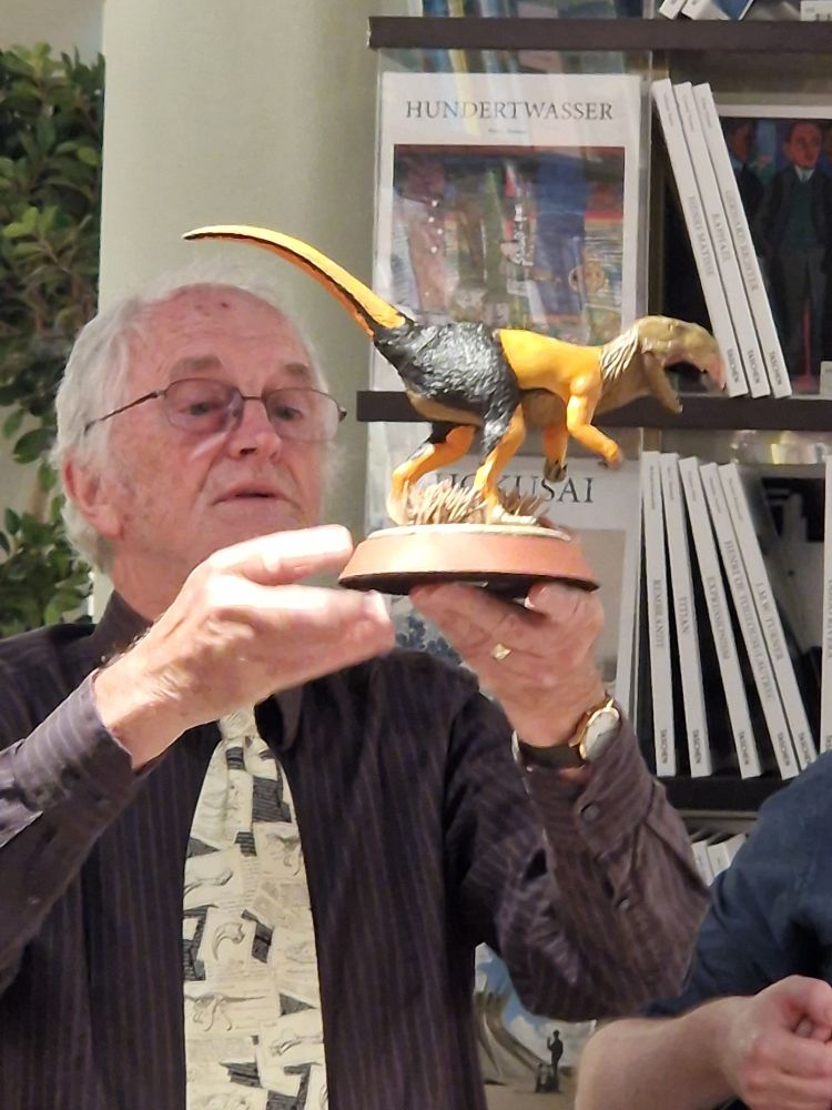Dougal Dixon holding model Cutlasstooth. 