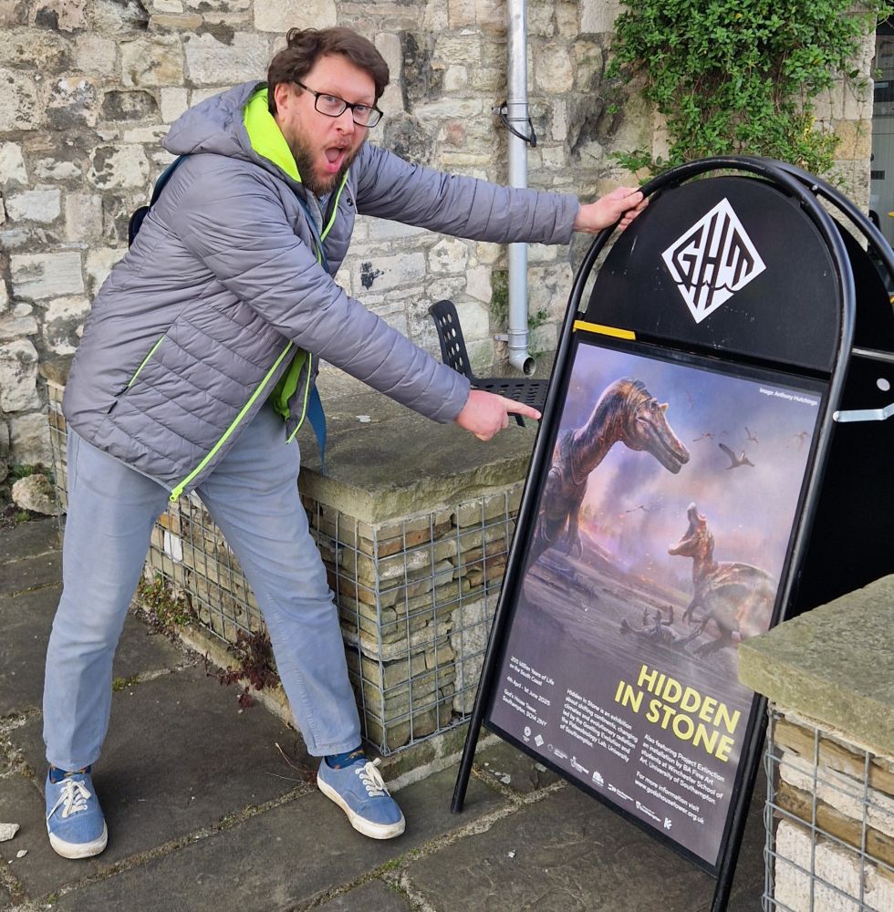 Naish soyjacking to a sign. Again, jesus. 
