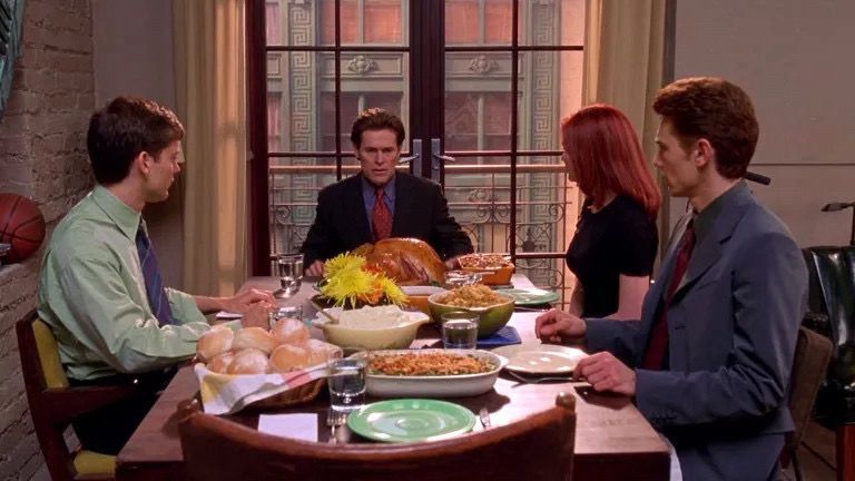 Peter Parker, Norman Osborn, Mary Jane Watson, and Harry Osborn sit down to Thanksgiving dinner, in Sam Raimi's "Spider-Man" (2002, Columbia Pictures)
