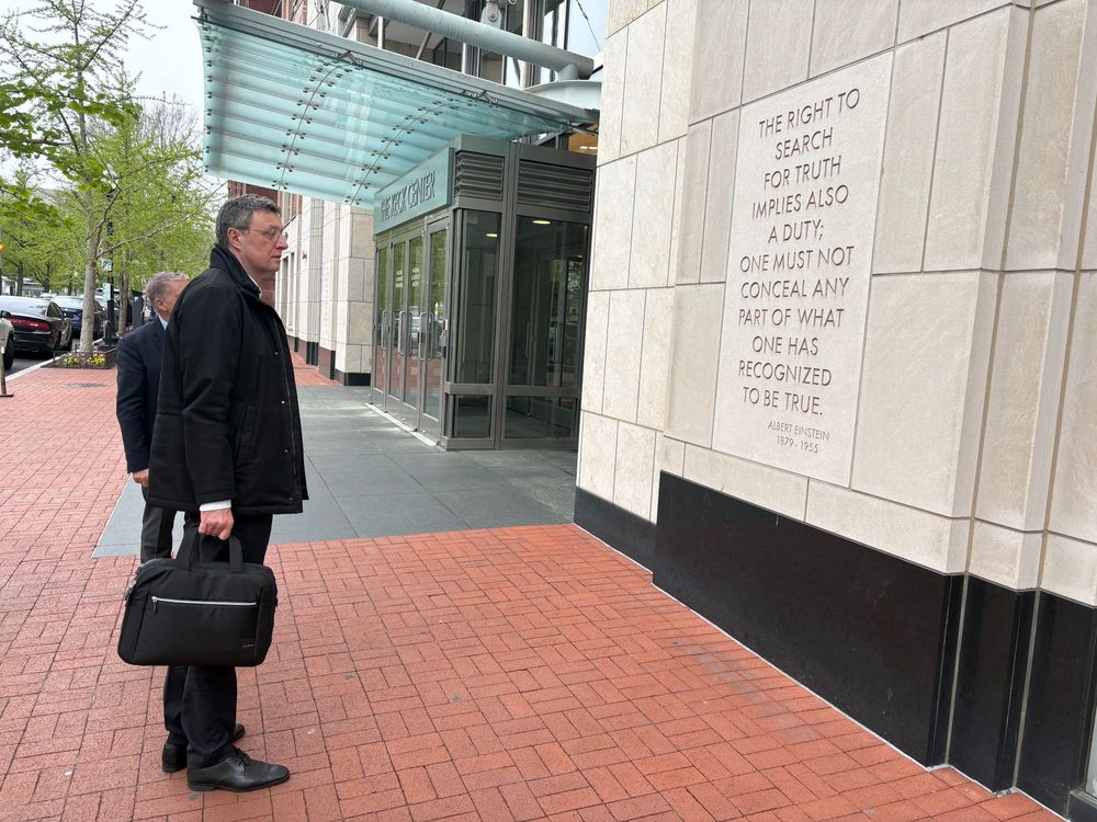Patrick Cramer reading a quote by Albert Einstein: "The right to search for truth implies also a duty; one must not conceal any part of what one has recognized to be true."