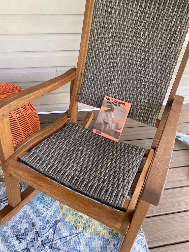 Book on porch rocking chair 