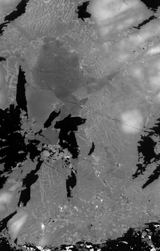 SEM-CL map of fractured plagioclase, quartz, K-feldspar, and mafic phases (black) next to a ductile shear zone (at bottom and out of sight)