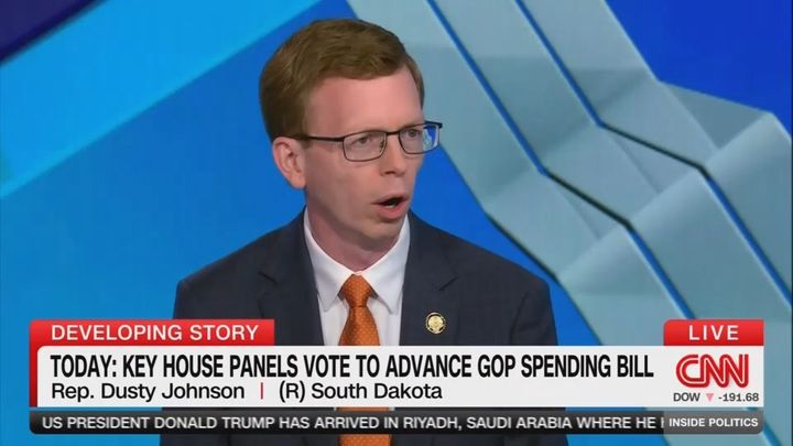 nerdy white david spade-looking congressman named Dusty Johnson (R - South Dakota) on CNN