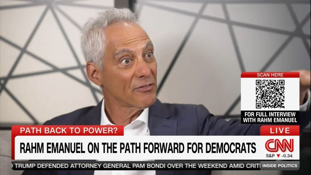 screnshot of CNN interview with Rahm Emmanuel. You can scan a QR code "for Full interview with Rahm Emanuel"