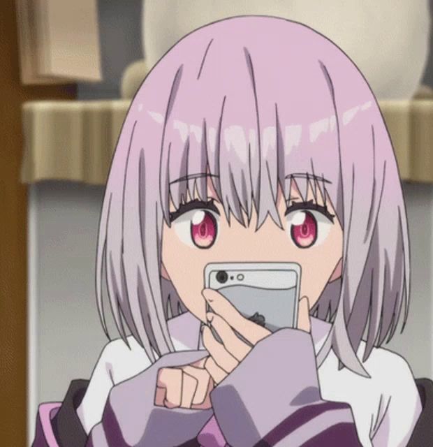 a girl with pink hair and red eyes is holding a cell phone