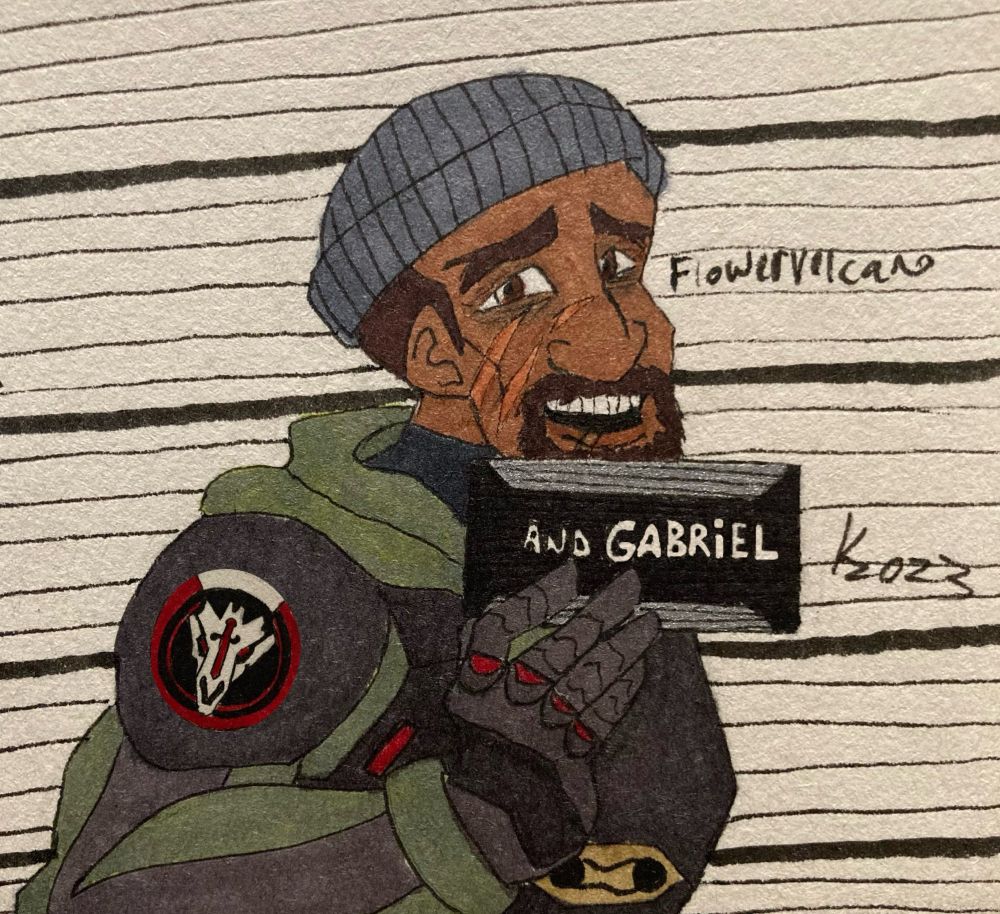 Strike Commander Gabriel Reyes holding a sign with his name after getting arrested, he has a smile on his face. 