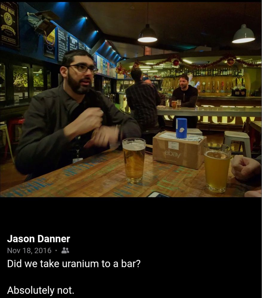 Screenshot of a Facebook post from Nov 18th 2016 of Raf sitting at Fork & Brewer pub in Wellington next to a box that we definitely didn't discover contained uranium earlier that day at Kiwicon...