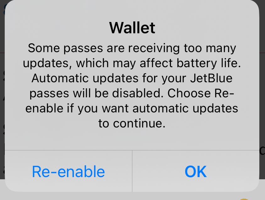 An Apple wallet alert calling out a pass that’s using too much battery life due to too many updates. The alert says automatic updates for that pass have been disabled