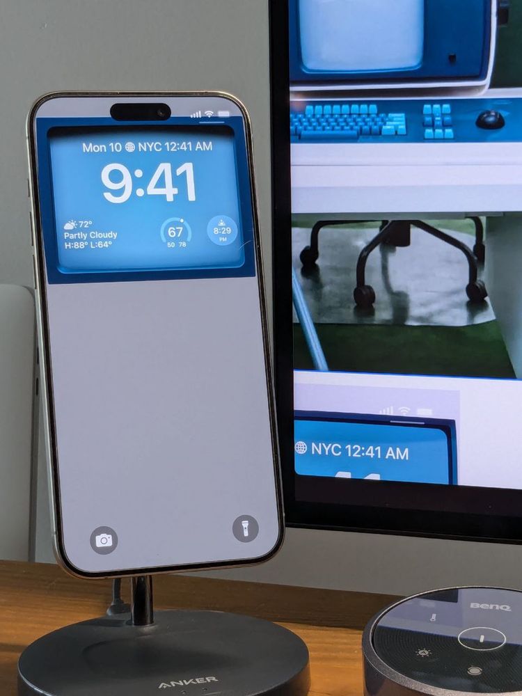 An iPhone with a severance-inspired wallpaper