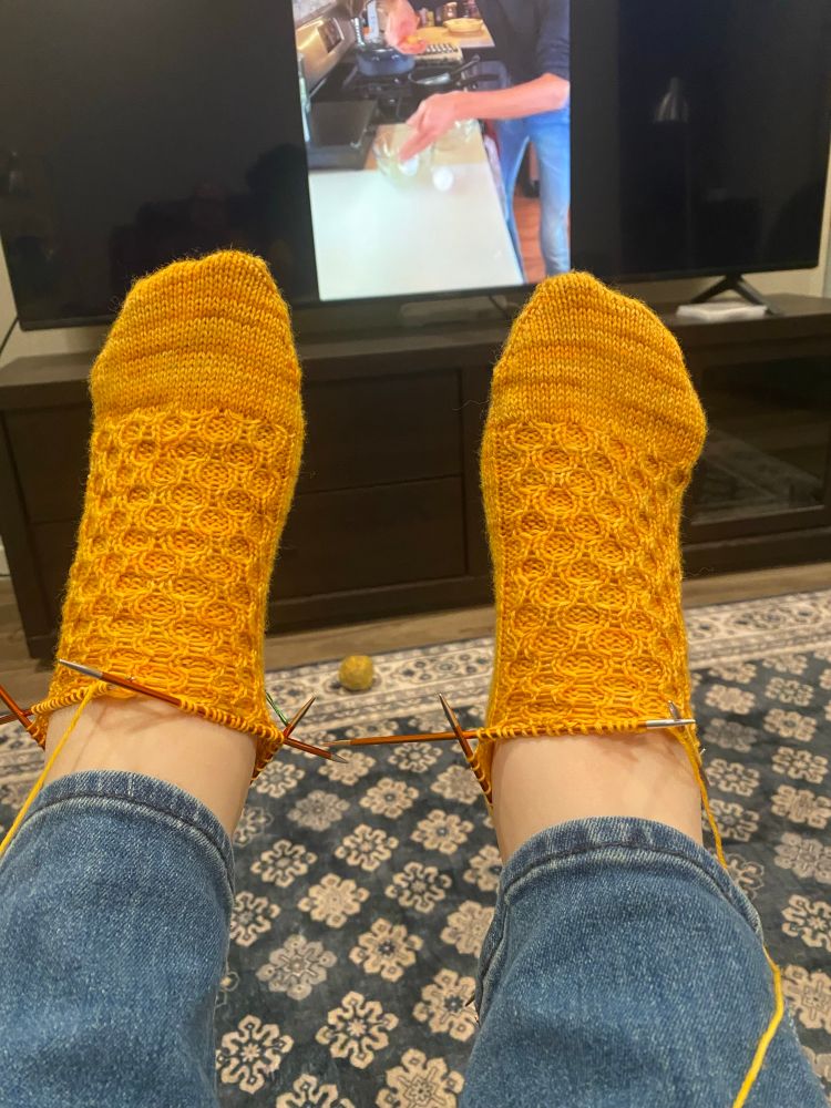 The socks are shown on feet!