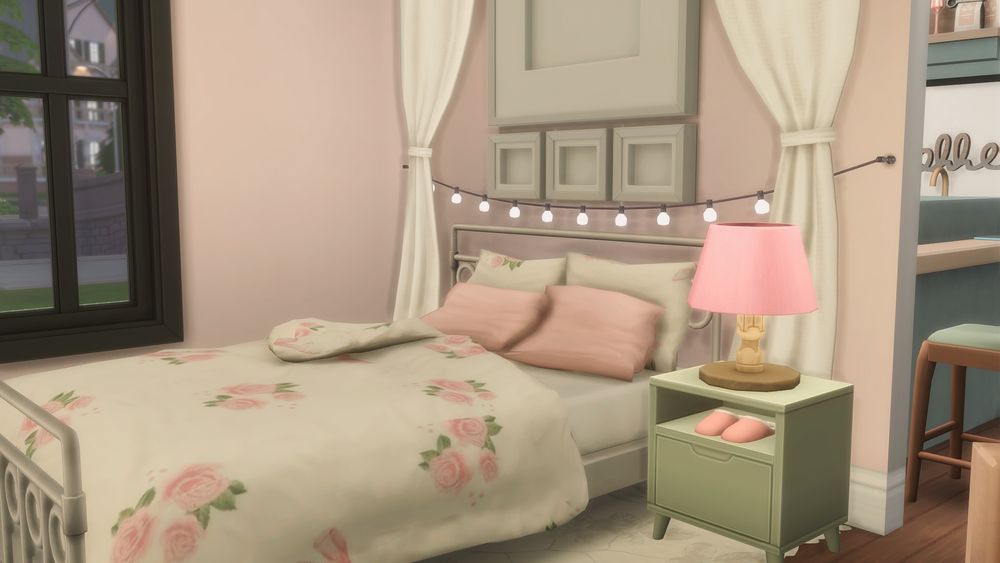 the sims 4 screenshot featuring a light pink and green aesthetic bedroom