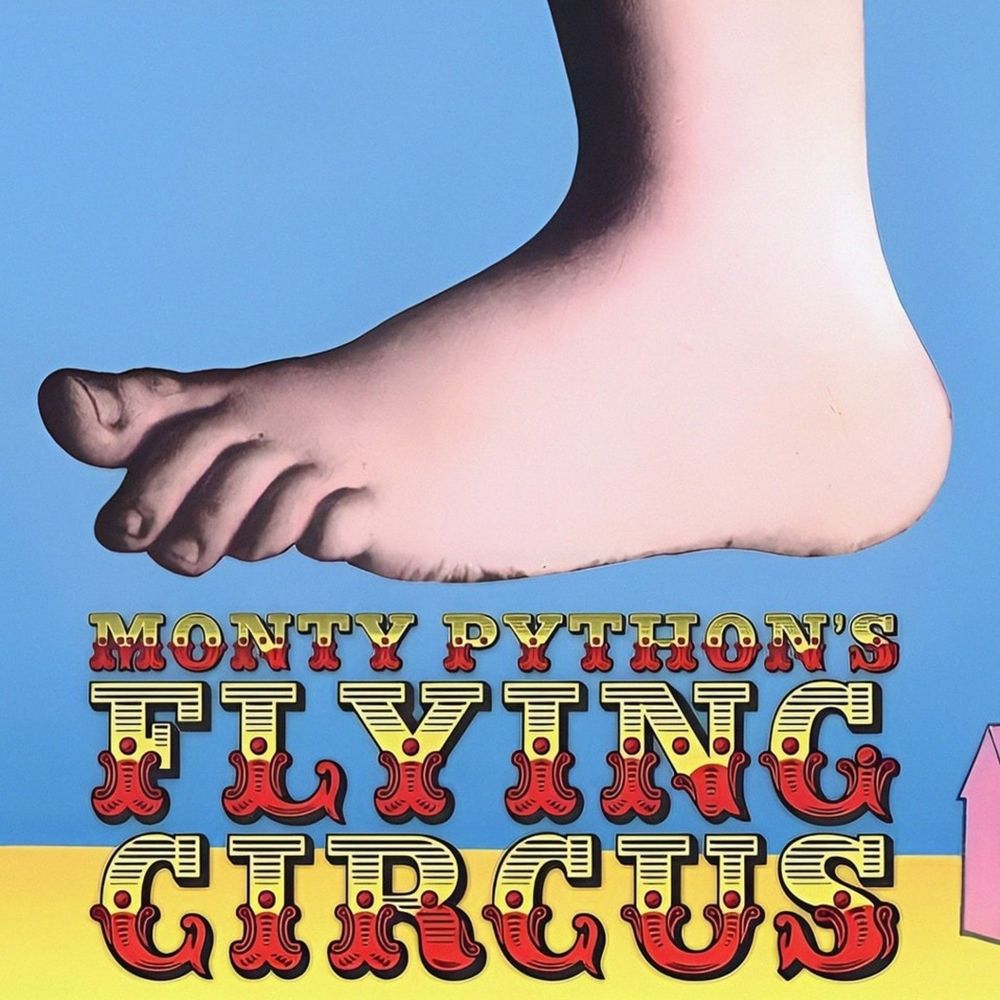 Cupid's foot, from the painting "Venus, Cupid, Folly and Time," (1540-1545) by Angelo Bronzino.

The text says:
"MONTY PYTHON'S
FLYING CIRCUS"