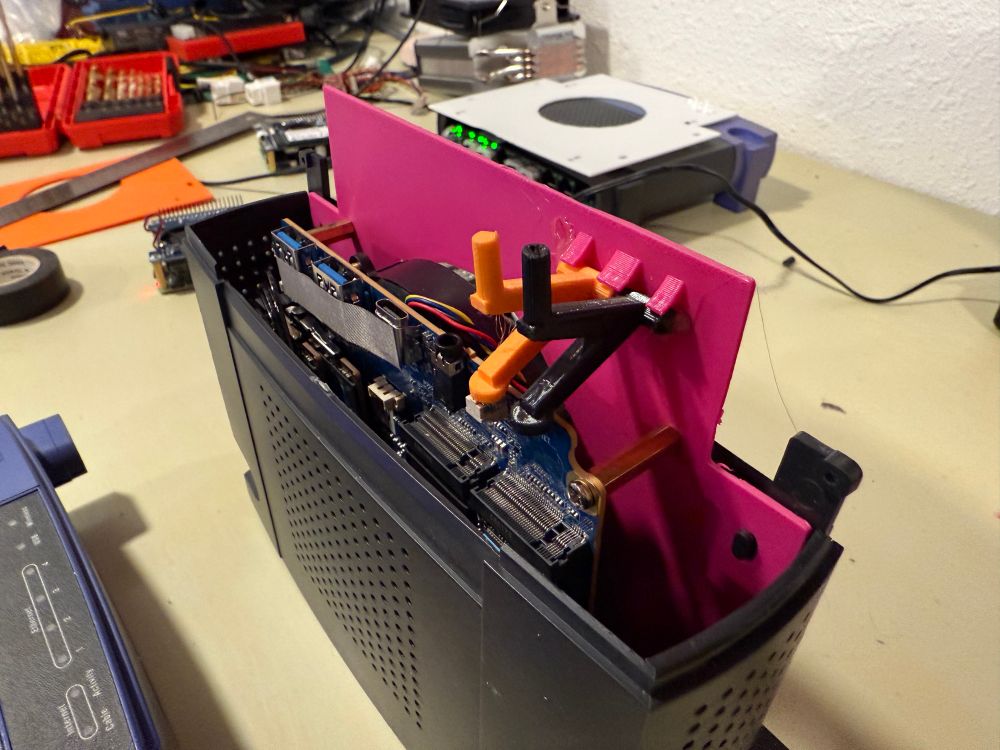 A weird, multi colored 3d printed contraption 