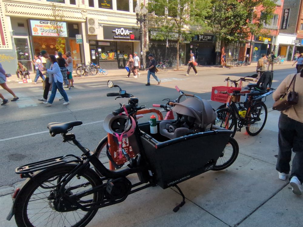 Image of a full bike rack on Milwaukee Avenue during temporary pedestrianization