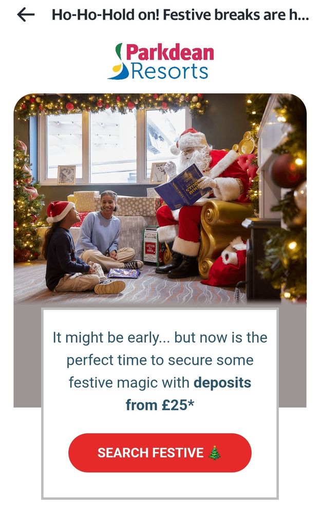 Advertisement (received in early July) for Christmas booking at camping and caravan holiday parks, featuring Father Christmas reading to 2 children.