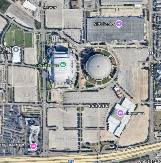 NRG Stadium surrounded by parking lots. 