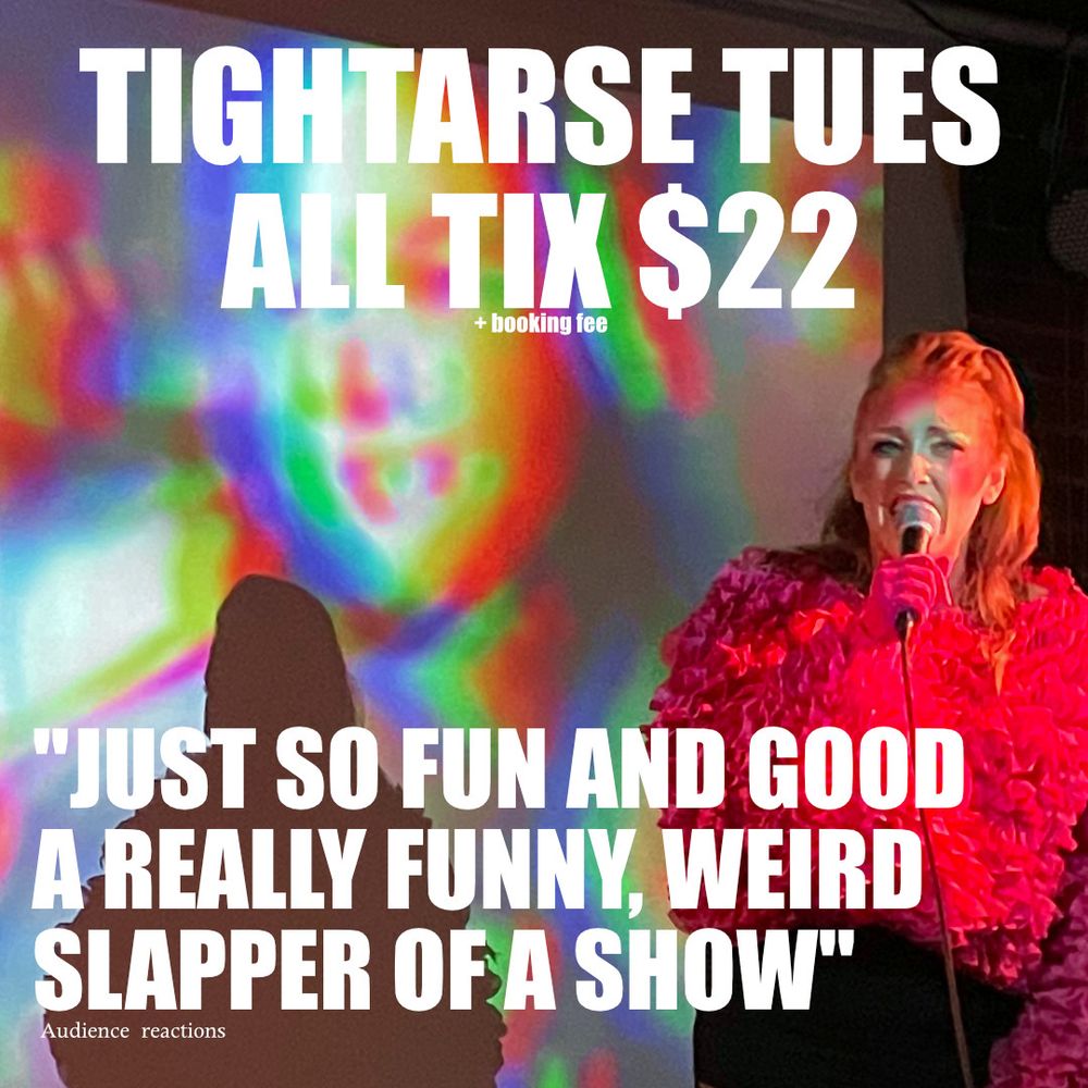 Redheaded sweaty woman in a ruffled pink top with a microphone in front of a screen with the text "Tightarse Tues All Tic $22" and "Just so fun and good, a really funny, weird slapper of a show"